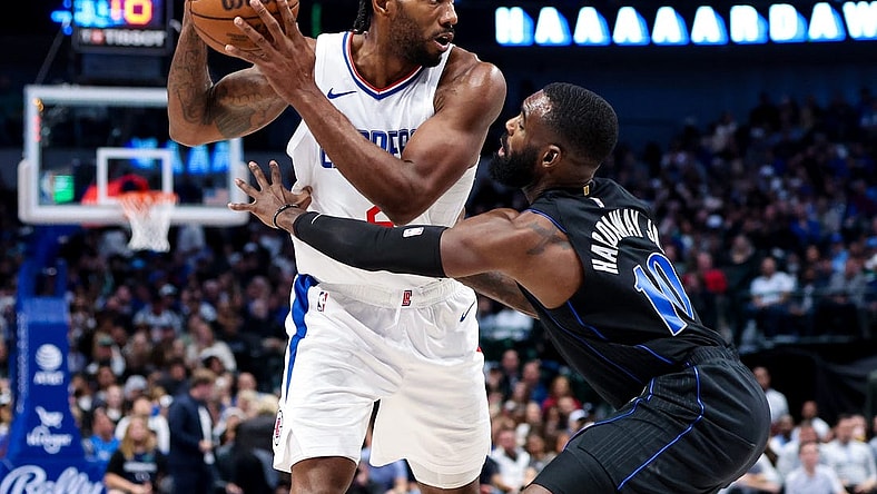 Nov 10, 2023; Dallas, Texas, USA;  LA Clippers forward Kawhi Leonard (2) looks to pass as Dallas Mavericks forward Tim Hardaway Jr. (10) defends  during the second half at American Airlines Center. Mandatory Credit: Kevin Jairaj-USA TODAY Sports