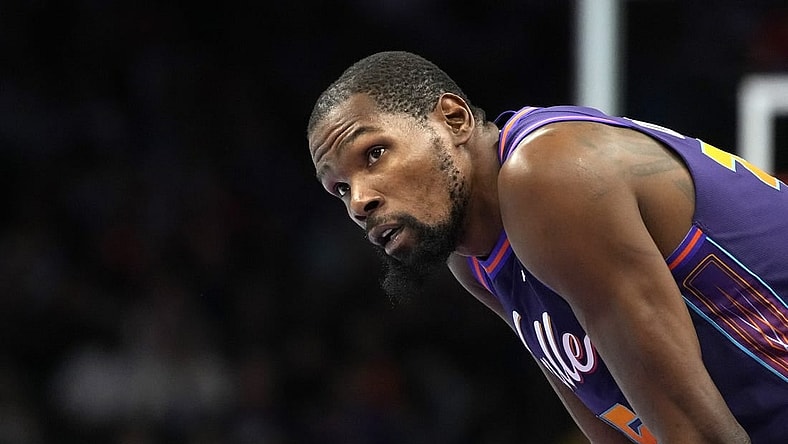 Nov 10, 2023; Phoenix, Arizona, USA; Phoenix Suns forward Kevin Durant (35) watches a replay against the Los Angeles Lakers in the first half at Footprint Center. Mandatory Credit: Rick Scuteri-USA TODAY Sports