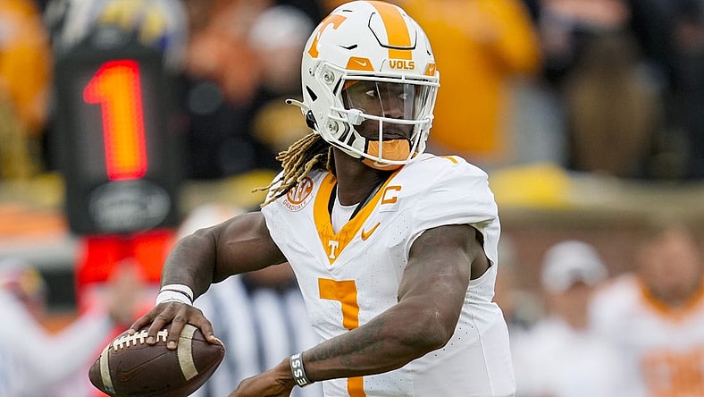 Nov 11, 2023; Columbia, Missouri, USA; Tennessee Volunteers quarterback Joe Milton III (7) throws a pass during the first half against the Missouri Tigers at Faurot Field at Memorial Stadium. Mandatory Credit: Jay Biggerstaff-USA TODAY Sports