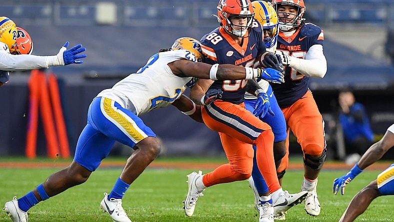 Nov 11, 2023; New York, New York, USA;  Pittsburgh Panthers defensive back Noah Biglow (28) attempts a tackle ion Syracuse Orange tight end Dan Villari (89) during the first half at Yankee Stadium. Mandatory Credit: Dennis Schneidler-USA TODAY Sports