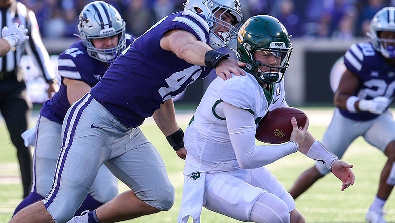 Nov 11, 2023; Manhattan, Kansas, USA; Baylor Bears quarterback Blake Shapen (12) is sacked by Kansas State Wildcats defensive end Cody Stufflebean (47) during the second quarter at Bill Snyder Family Football Stadium. Mandatory Credit: Scott Sewell-USA TODAY Sports