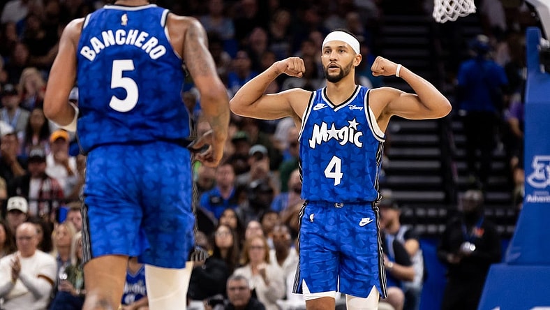 Nov 11, 2023; Orlando, Florida, USA; Orlando Magic guard Jalen Suggs (4) gestures towards Orlando Magic forward Paolo Banchero (5) during the first half against the Milwaukee Bucks at Amway Center. Mandatory Credit: Matt Pendleton-USA TODAY Sports