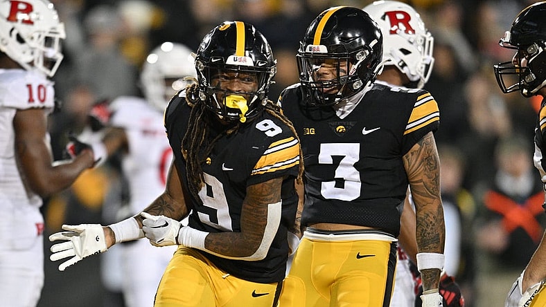 Nov 11, 2023; Iowa City, Iowa, USA; Iowa Hawkeyes running back Jaziun Patterson (9) and wide receiver Kaleb Brown (3) react after a touchdown by Patterson against the Rutgers Scarlet Knights during the fourth quarter at Kinnick Stadium. Mandatory Credit: Jeffrey Becker-USA TODAY Sports