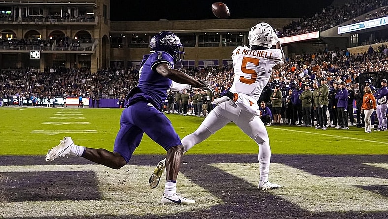 Texas Longhorns wide receiver Adonai Mitchell (5) makes a catch for a touchdown during the game against Texas Christian University at Amon G. Carter Stadium on Saturday, Nov. 11, 2023 in Fort Worth, Texas.
