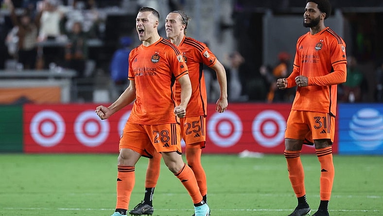 Nov 11, 2023; Houston, Texas, USA; Houston Dynamo defender Erik Sviatchenko (28), midfielder Griffin Dorsey (25), and defender Micael (31) react after the game against Real Salt Lake at Shell Energy Stadium. Mandatory Credit: Troy Taormina-USA TODAY Sports