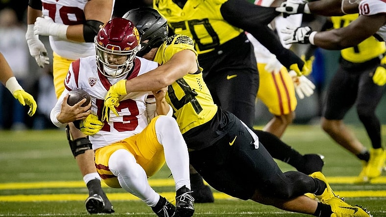 Oregon outside linebacker Teitum Tuioti sacks USC quarterback Caleb Williams as the No. 6 Oregon Ducks host the USC Trojans Saturday, Nov. 11, 2023, at Autzen Stadium in Eugene, Ore.