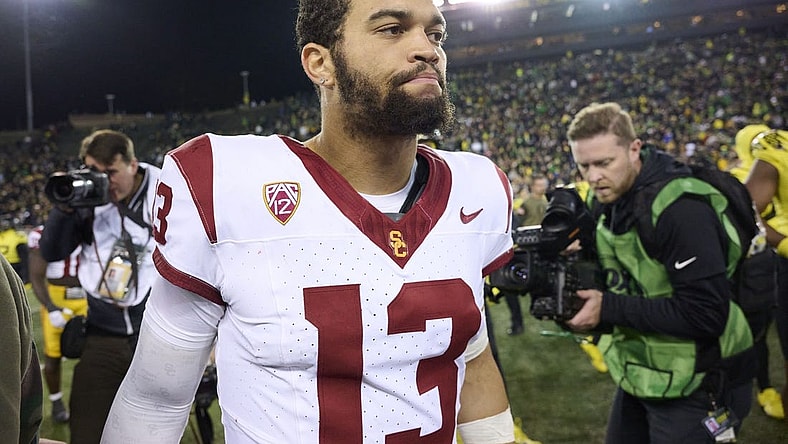Nov 11, 2023; Eugene, Oregon, USA; USC Trojans quarterback Caleb Williams (13) walks off the field after a game against the Oregon Ducks at Autzen Stadium. Mandatory Credit: Troy Wayrynen-USA TODAY Sports
