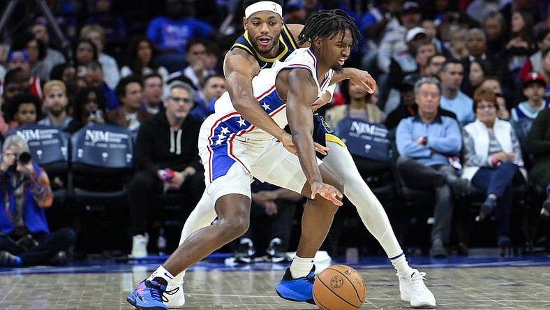 Nov 12, 2023; Philadelphia, Pennsylvania, USA; Indiana Pacers forward Bruce Brown (11) tries to steal the ball away from Philadelphia 76ers guard Tyrese Maxey (0) during the first quarter at Wells Fargo Center. Mandatory Credit:  John Jones-USA TODAY Sports