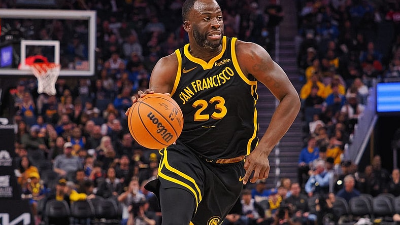 Nov 12, 2023; San Francisco, California, USA; Golden State Warriors forward Draymond Green (23) controls the ball against the Minnesota Timberwolves during the third quarter at Chase Center. Mandatory Credit: Kelley L Cox-USA TODAY Sports