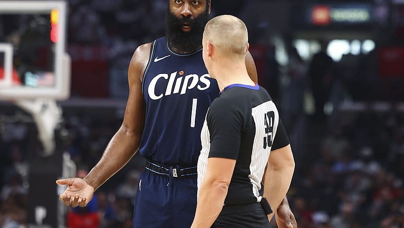 Nov 12, 2023; Los Angeles, California, USA; LA Clippers guard James Harden (1) speaks with the referee during the first half of a game against the Memphis Grizzlies at Crypto.com Arena. Mandatory Credit: Jessica Alcheh-USA TODAY Sports