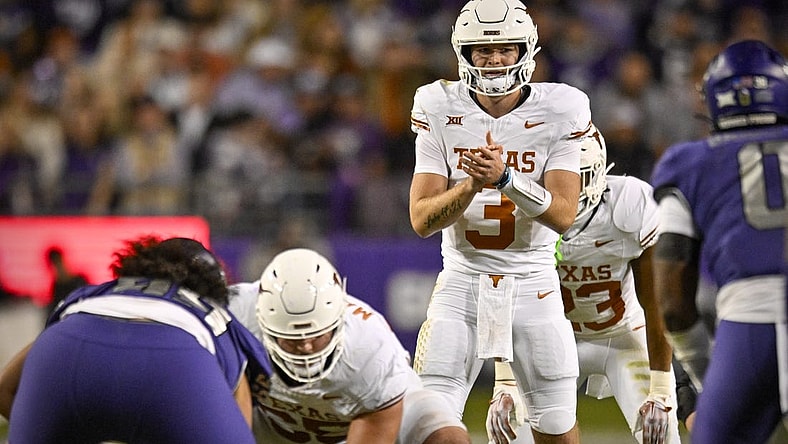 Nov 11, 2023; Fort Worth, Texas, USA; Texas Longhorns quarterback Quinn Ewers (3) in action during the game between the TCU Horned Frogs and the Texas Longhorns at Amon G. Carter Stadium. Mandatory Credit: Jerome Miron-USA TODAY Sports