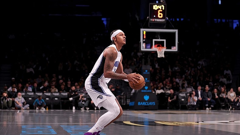 Nov 14, 2023; Brooklyn, New York, USA; Orlando Magic forward Paolo Banchero (5) looks to shoot the ball against the Brooklyn Nets during the first quarter at Barclays Center. Mandatory Credit: Brad Penner-USA TODAY Sports