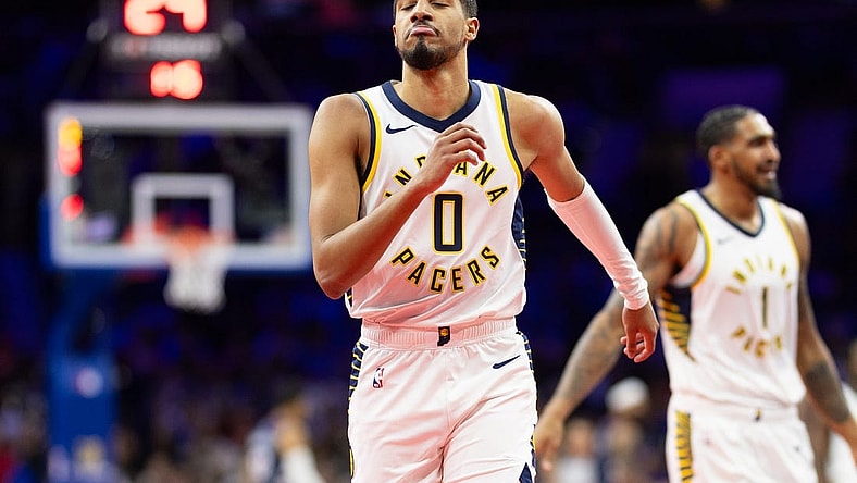 Nov 14, 2023; Philadelphia, Pennsylvania, USA; Indiana Pacers guard Tyrese Haliburton (0) reacts to his three point score against the Philadelphia 76ers during the second quarter at Wells Fargo Center. Mandatory Credit: Bill Streicher-USA TODAY Sports