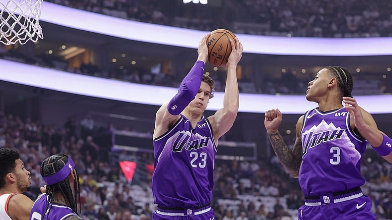 Nov 14, 2023; Salt Lake City, Utah, USA; Utah Jazz forward Lauri Markkanen (23) grabs the rebound during the first quarter against the Portland Trail Blazers at Delta Center. Mandatory Credit: Chris Nicoll-USA TODAY Sports