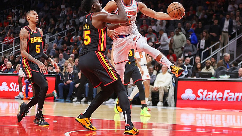Nov 15, 2023; Atlanta, Georgia, USA; New York Knicks guard Josh Hart (3) passes around Atlanta Hawks center Clint Capela (15) in the first quarter at State Farm Arena. Mandatory Credit: Brett Davis-USA TODAY Sports