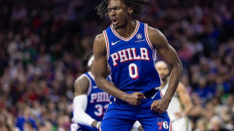 Nov 15, 2023; Philadelphia, Pennsylvania, USA; Philadelphia 76ers guard Tyrese Maxey (0) reacts after his score and one against the Boston Celtics during the third quarter at Wells Fargo Center. Mandatory Credit: Bill Streicher-USA TODAY Sports