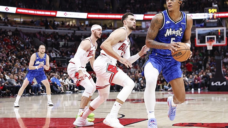 Nov 15, 2023; Chicago, Illinois, USA; Orlando Magic forward Paolo Banchero (5) looks to shoot against Chicago Bulls guard Zach LaVine (8) during the second half at United Center. Mandatory Credit: Kamil Krzaczynski-USA TODAY Sports