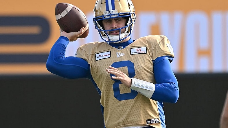 Nov 16, 2023; Hamilton, Ontario, CAN;  Winnipeg Blue Bombers quarterback Zach Collaros (8) throws a pass during practice at Tim Hortons Field. Mandatory Credit: Dan Hamilton-USA TODAY Sports