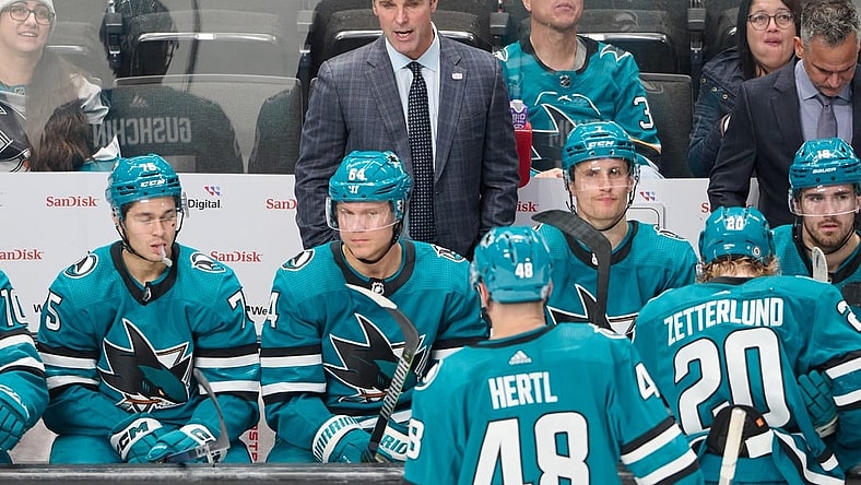 Nov 16, 2023; San Jose, California, USA; San Jose Sharks head coach David Quinn watches the game from the bench against the St. Louis Blues during the third period at SAP Center at San Jose. Mandatory Credit: Robert Edwards-USA TODAY Sports