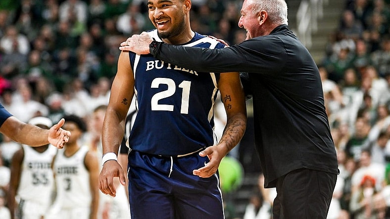 Butler's Pierre Brooks II, left, and head coach Thad Matta laugh after Brooks was called for a technical foul after celebrating his dunk against Michigan State during the first half on Friday, Nov. 17, 2023, in East Lansing.