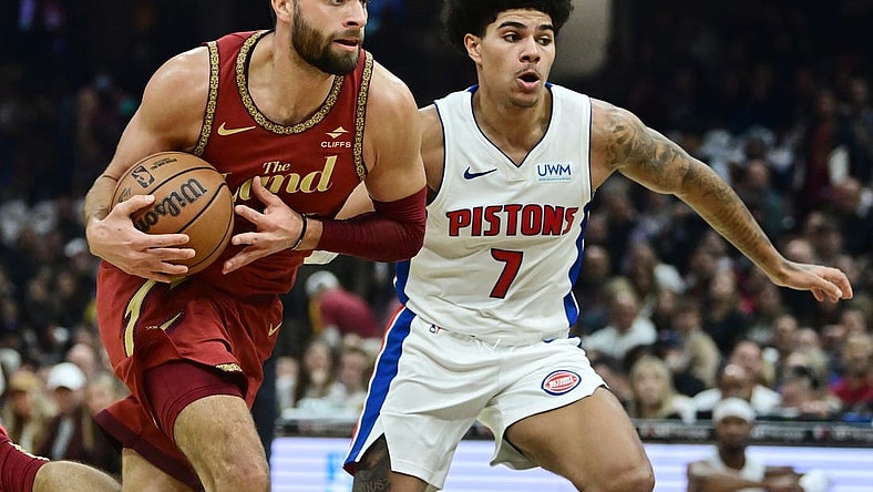 Nov 17, 2023; Cleveland, Ohio, USA; Cleveland Cavaliers guard Max Strus (1) drives to the basket against Detroit Pistons guard Killian Hayes (7) during the first half at Rocket Mortgage FieldHouse. Mandatory Credit: Ken Blaze-USA TODAY Sports