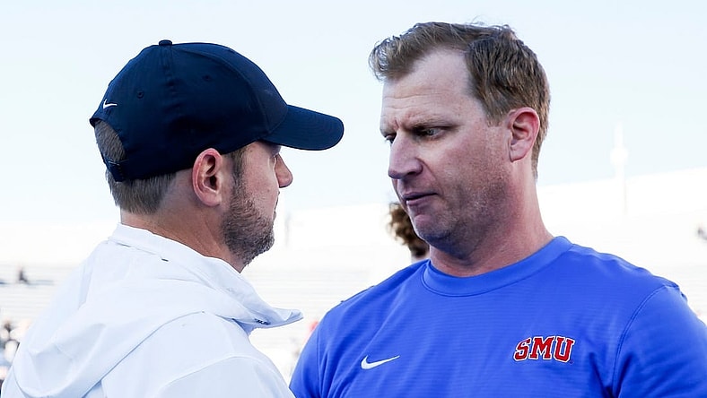 Memphis' head coach Ryan Silverfield and SMU head coach Rhett Lashlee speak after Memphis lost to SMU 38-34 at Simmons Bank Liberty Stadium in Memphis, Tenn., on Saturday, November 18, 2023.