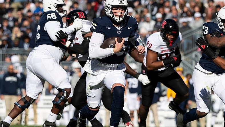 Penn State quarterback Drew Allar keeps the ball on the ground during an NCAA football game against Rutgers Saturday, Nov. 18, 2023, in State College, Pa. The Nittany Lions won, 27-6.