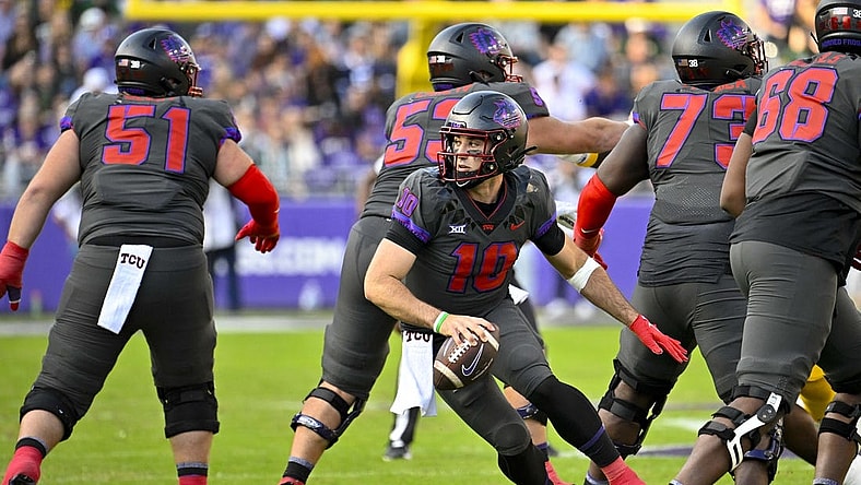 Nov 18, 2023; Fort Worth, Texas, USA; TCU Horned Frogs quarterback Josh Hoover (10) runs with the ball against the Baylor Bears during the first half at Amon G. Carter Stadium. Mandatory Credit: Jerome Miron-USA TODAY Sports