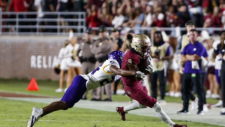 Nov 18, 2023; Tallahassee, Florida, USA; Florida State Seminoles running back Lawrance Toafili (9) tackled by North Alabama Lions defensive back Cameron Jamar (24) during the second quarter at Doak S. Campbell Stadium. Mandatory Credit: Morgan Tencza-USA TODAY Sports
