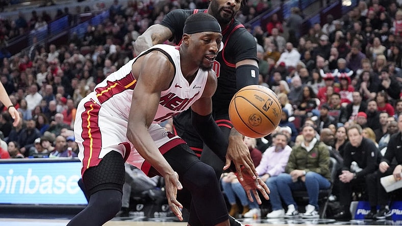 Nov 18, 2023; Chicago, Illinois, USA; Chicago Bulls center Andre Drummond (3) defends Miami Heat center Bam Adebayo (13) during the first half at United Center. Mandatory Credit: David Banks-USA TODAY Sports