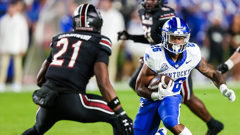 Nov 18, 2023; Columbia, South Carolina, USA; Kentucky Wildcats running back Ramon Jefferson (26) rushes against the South Carolina Gamecocks in the second quarter at Williams-Brice Stadium. Mandatory Credit: Jeff Blake-USA TODAY Sports Kentucky