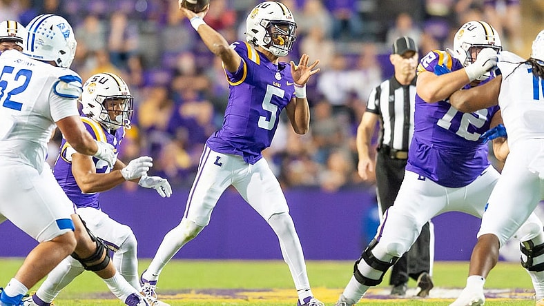 Quarterback Jayden Daniels 5 throws a pass as the LSU Tigers take on Georgia State in Tiger Stadium in Baton Rouge, Louisiana, November 18, 2023.
