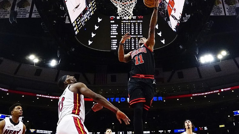 Nov 18, 2023; Chicago, Illinois, USA; Miami Heat center Bam Adebayo (13) defends Chicago Bulls forward DeMar DeRozan (11) during the second half at United Center. Mandatory Credit: David Banks-USA TODAY Sports