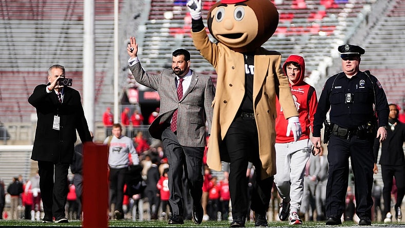 Nov 18, 2023; Columbus, Ohio, USA; Ohio State Buckeyes head coach Ryan Day walks into Ohio Stadium behind Brutus Buckeye prior to the NCAA football game against the Minnesota Golden Gophers.