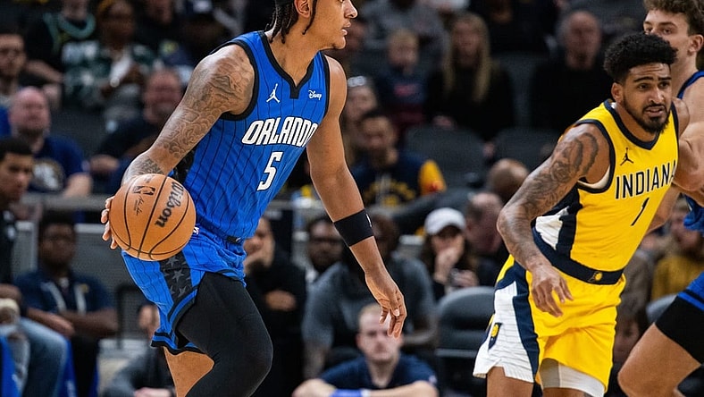 Nov 19, 2023; Indianapolis, Indiana, USA; Orlando Magic forward Paolo Banchero (5) dribbles the ball in the first quarter against the Indiana Pacers at Gainbridge Fieldhouse. Mandatory Credit: Trevor Ruszkowski-USA TODAY Sports