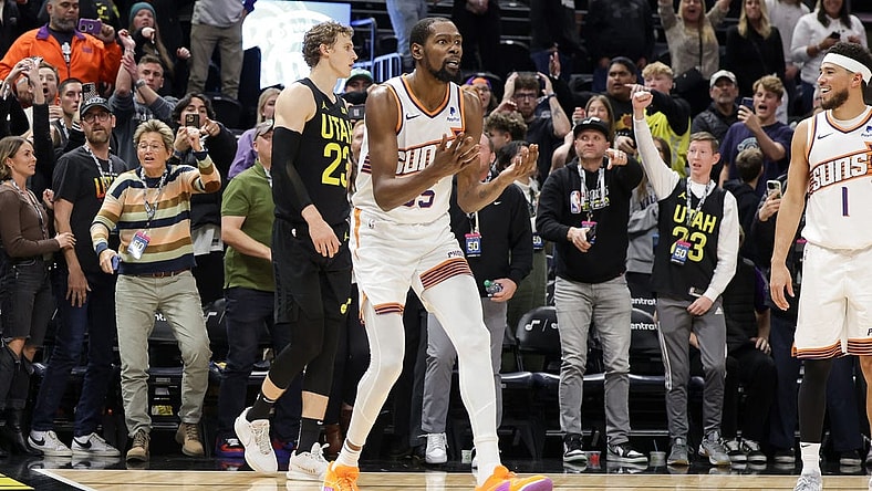 Nov 19, 2023; Salt Lake City, Utah, USA;  Phoenix Suns forward Kevin Durant (35) reacts after a foul is called on a shot by Utah Jazz forward Lauri Markkanen (23) during the second half at Delta Center. Mandatory Credit: Chris Nicoll-USA TODAY Sports