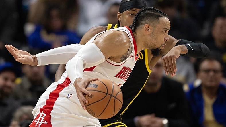 Nov 20, 2023; San Francisco, California, USA; Houston Rockets guard Dillon Brooks (9) drives around Golden State Warriors guard Moses Moody (4) during the first quarter at Chase Center. Mandatory Credit: D. Ross Cameron-USA TODAY Sports