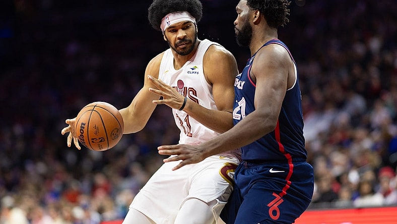 Nov 21, 2023; Philadelphia, Pennsylvania, USA; Cleveland Cavaliers center Jarrett Allen (31) controls the ball against Philadelphia 76ers center Joel Embiid (21) during the second quarter at Wells Fargo Center. Mandatory Credit: Bill Streicher-USA TODAY Sports