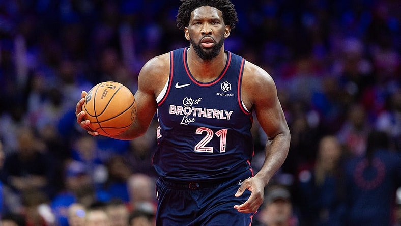Nov 21, 2023; Philadelphia, Pennsylvania, USA; Philadelphia 76ers center Joel Embiid (21) dribbles the ball against the Cleveland Cavaliers during the fourth quarter at Wells Fargo Center. Mandatory Credit: Bill Streicher-USA TODAY Sports