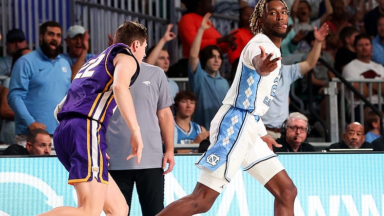 Nov 22, 2023; Paradise Island, BAHAMAS;  North Carolina Tar Heels forward Jae'Lyn Withers (24) reacts after scoring  over Northern Iowa Panthers forward Kyle Pock (22) during the first half at Imperial Arena. Mandatory Credit: Kevin Jairaj-USA TODAY Sports