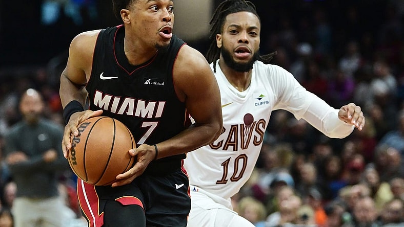 Nov 22, 2023; Cleveland, Ohio, USA; Miami Heat guard Kyle Lowry (7) drives to the basket against Cleveland Cavaliers guard Darius Garland (10) during the first half at Rocket Mortgage FieldHouse. Mandatory Credit: Ken Blaze-USA TODAY Sports