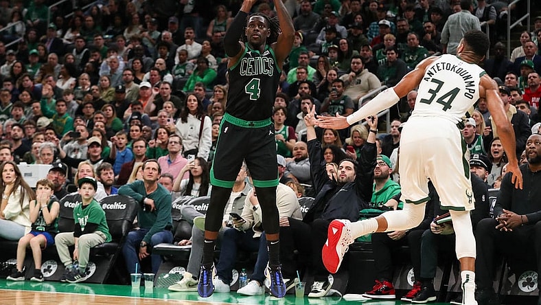Nov 22, 2023; Boston, Massachusetts, USA; Boston Celtics guard Jrue Holiday (4) shoots during the first half against the Milwaukee Bucks at TD Garden. Mandatory Credit: Paul Rutherford-USA TODAY Sports