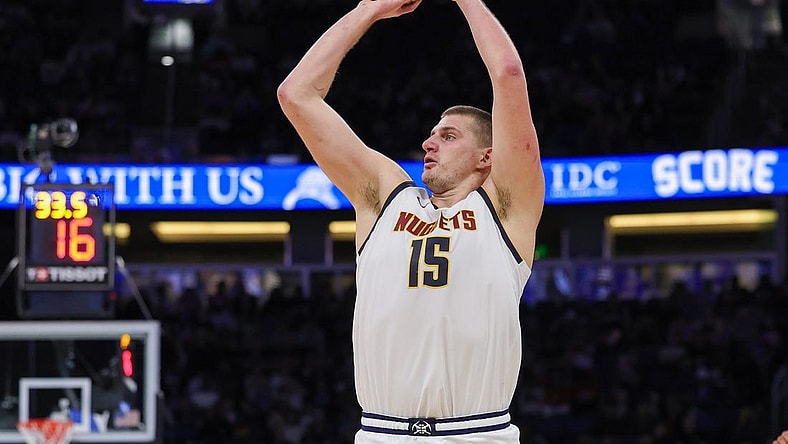 Nov 22, 2023; Orlando, Florida, USA; Denver Nuggets center Nikola Jokic (15) shoots the ball during the second quarter against the Orlando Magic at Amway Center. Mandatory Credit: Mike Watters-USA TODAY Sports