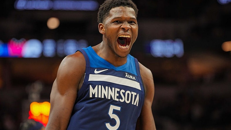 Nov 22, 2023; Minneapolis, Minnesota, USA; Minnesota Timberwolves guard Anthony Edwards (5) celebrates his basket against the Philadelphia 76ers in the third quarter at Target Center. Mandatory Credit: Brad Rempel-USA TODAY Sports