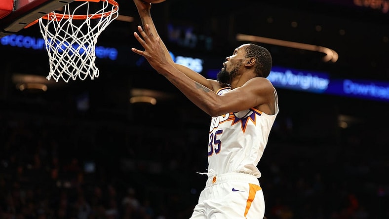Nov 22, 2023; Phoenix, Arizona, USA; Phoenix Suns forward Kevin Durant (35) against the Golden State Warriors in the second half at Footprint Center. Mandatory Credit: Mark J. Rebilas-USA TODAY Sports