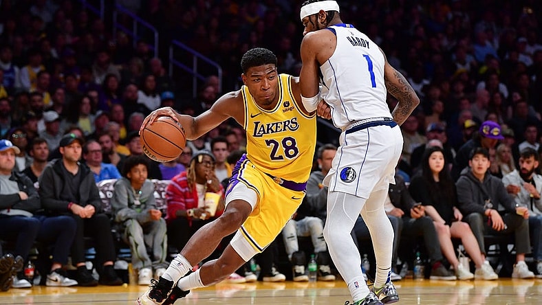 Nov 22, 2023; Los Angeles, California, USA; Los Angeles Lakers forward Rui Hachimura (28) moves to the basket against Dallas Mavericks guard Jaden Hardy (1) during the second half at Crypto.com Arena. Mandatory Credit: Gary A. Vasquez-USA TODAY Sports
