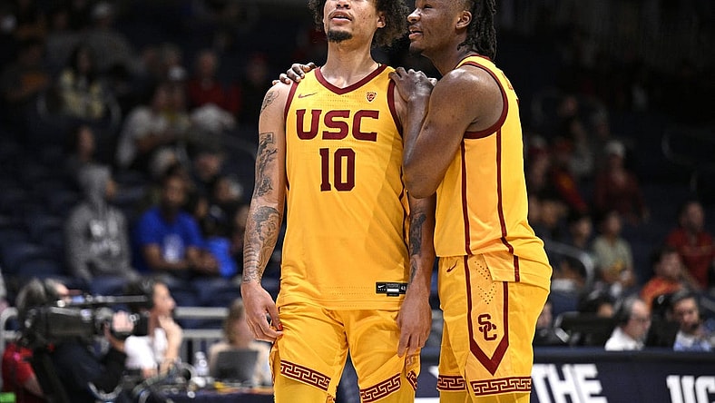 Nov 23, 2023; La Jolla, California, USA; USC Trojans forward DJ Rodman (10) and guard Isaiah Collier (1) embrace during the second half against the Seton Hall Pirates at LionTree Arena. Mandatory Credit: Orlando Ramirez-USA TODAY Sports