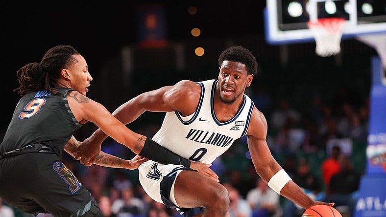 Nov 24, 2023; Paradise Island, BAHAMAS;  Villanova Wildcats guard TJ Bamba (0) controls the ball as Memphis Tigers guard Caleb Mills (9) defends during the first half at Imperial Arena. Mandatory Credit: Kevin Jairaj-USA TODAY Sports