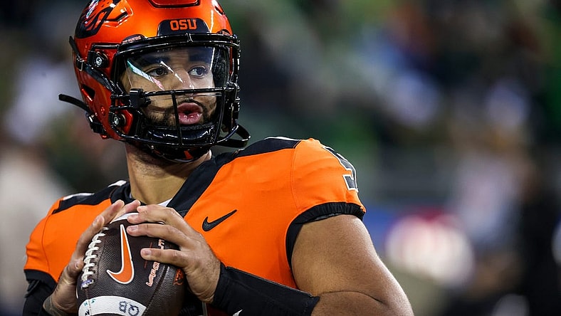 Oregon State Beavers quarterback DJ Uiagalelei warm ups before the annual rivalry game against Oregon on Friday, Nov. 24, 2023 at Autzen Stadium in Eugene, Ore.