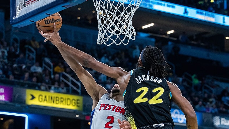 Nov 24, 2023; Indianapolis, Indiana, USA; Indiana Pacers forward Isaiah Jackson (22) blocks the shot of Detroit Pistons guard Cade Cunningham (2) in the first half at Gainbridge Fieldhouse. Mandatory Credit: Trevor Ruszkowski-USA TODAY Sports